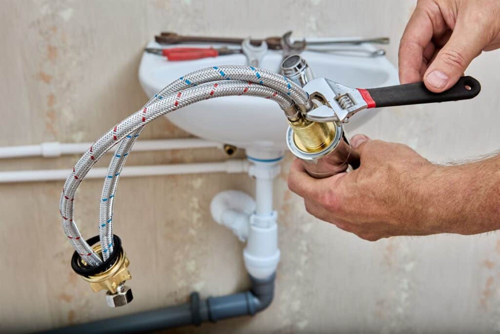 leaking laundry faucet repair provided by Wrench It Up plumbing and mechanical