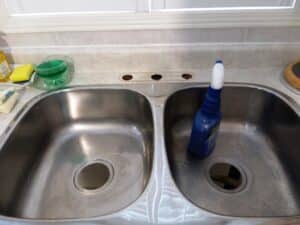 replace kitchen sink strainer done by Wrench It Up plumbing and mechanical