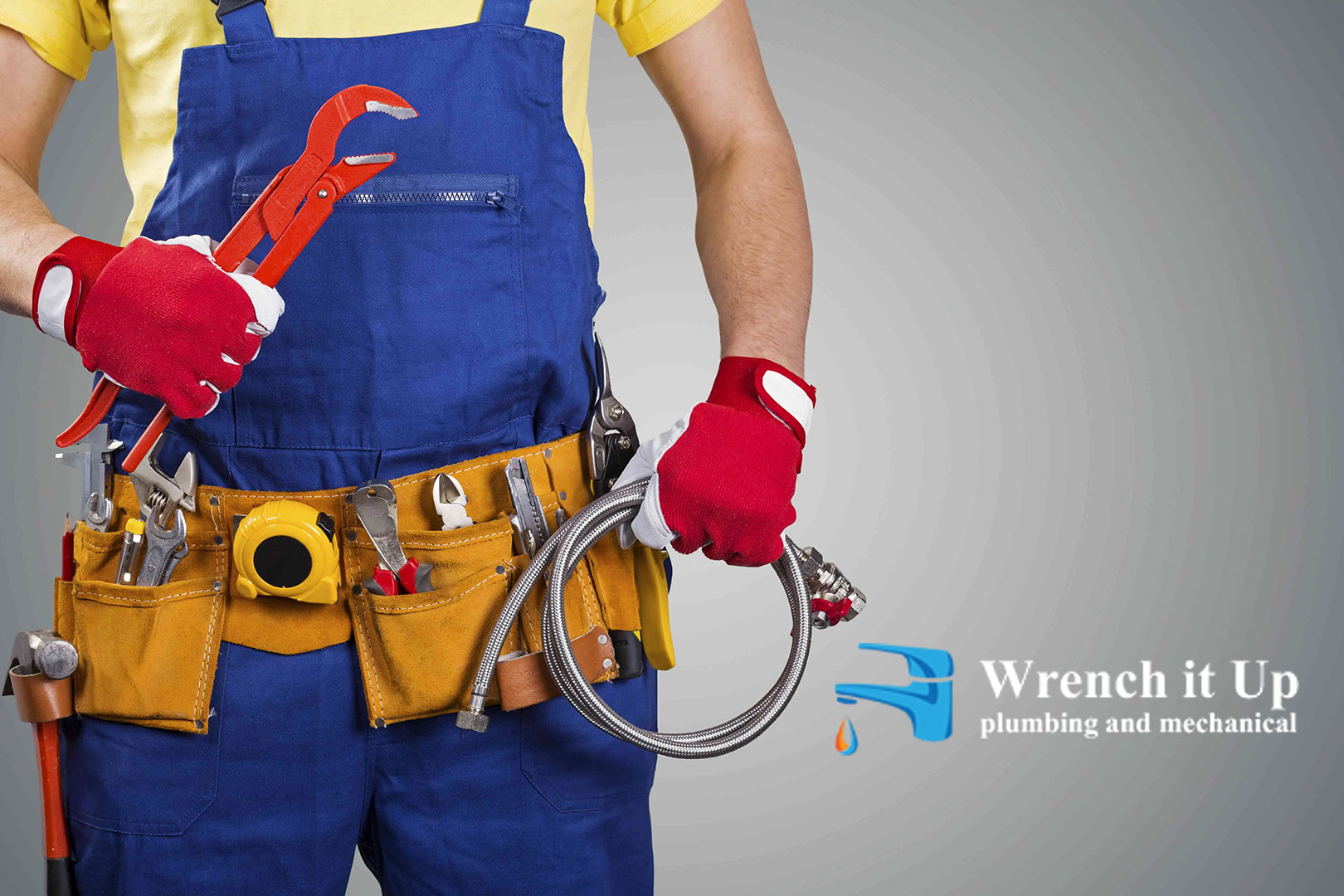 plumber with tools - Wrench It Up plumbing and mechanical