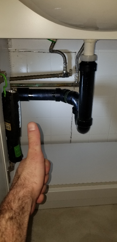 vanity sink drain replacement provided by Wrench It Up plumbing and mechanical