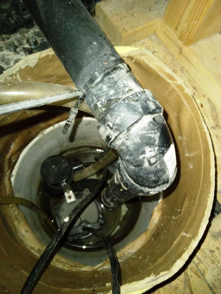 sump pump installation provided by Wrench It Up plumbing and mechanical