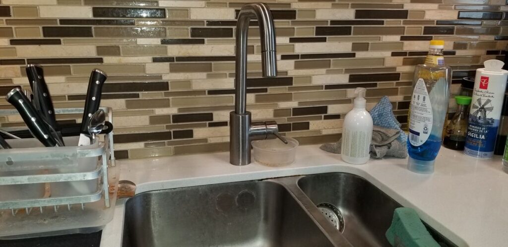 change kitchen faucet provided by Wrench It Up plumbing and mechanical