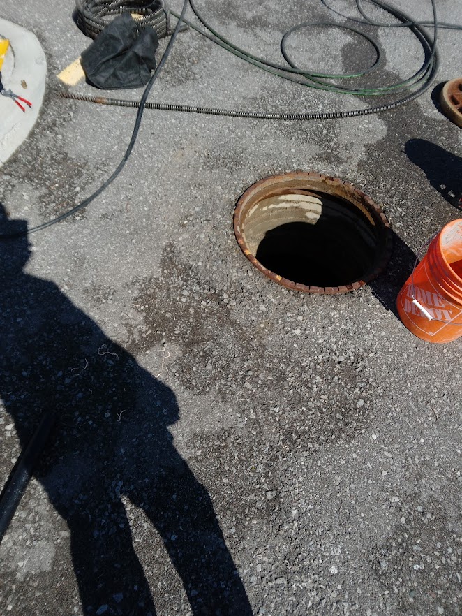 hydro flushing the main drain line provided by Wrench It Up plumbing and mechanical