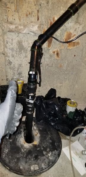Sump Pump Replacement provided by Wrench It Up plumbing and mechanical