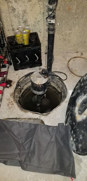 Sump Pump Replacement provided by Wrench It Up plumbing and mechanical